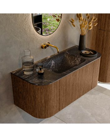 Mondiaz Kurve-Dlux 110cm badmeubel ronding Links + Rechts kleur Walnut met 1 lade en 2 deuren. Wastafel Cloud Midden zonder kraangat Lava.