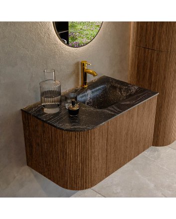 Mondiaz Kurve-Dlux 75cm badmeubel ronding Links kleur Walnut met 1 lade en 1 deur. Wastafel Grunne Rechts 1 kraangat Lava.