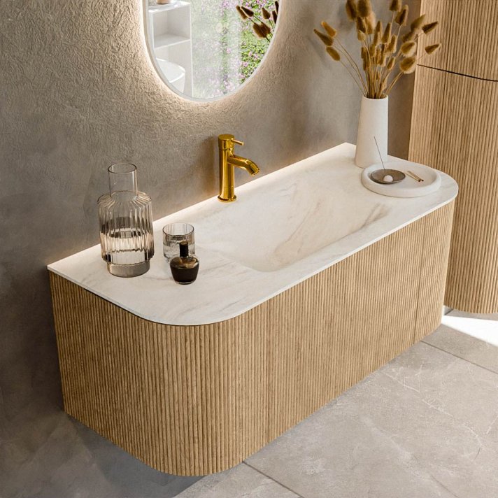 Mondiaz Kurve-Dlux 110cm badmeubel ronding Links + Rechts kleur Oak met 1 lade en 2 deuren. Wastafel Cloud Midden 1 kraangat Ostra.